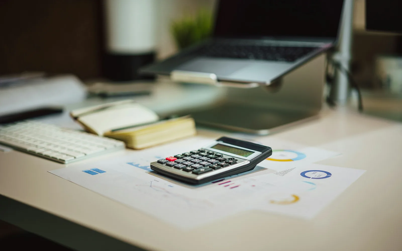 Calculator and documents for fee questions.